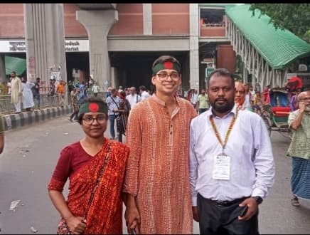 A family in festive attire on Pohela Boishakh